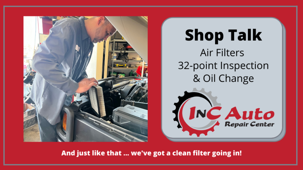 Auto mechanic installing a new, clean air filter at InC Auto Repair Center in Parker CO